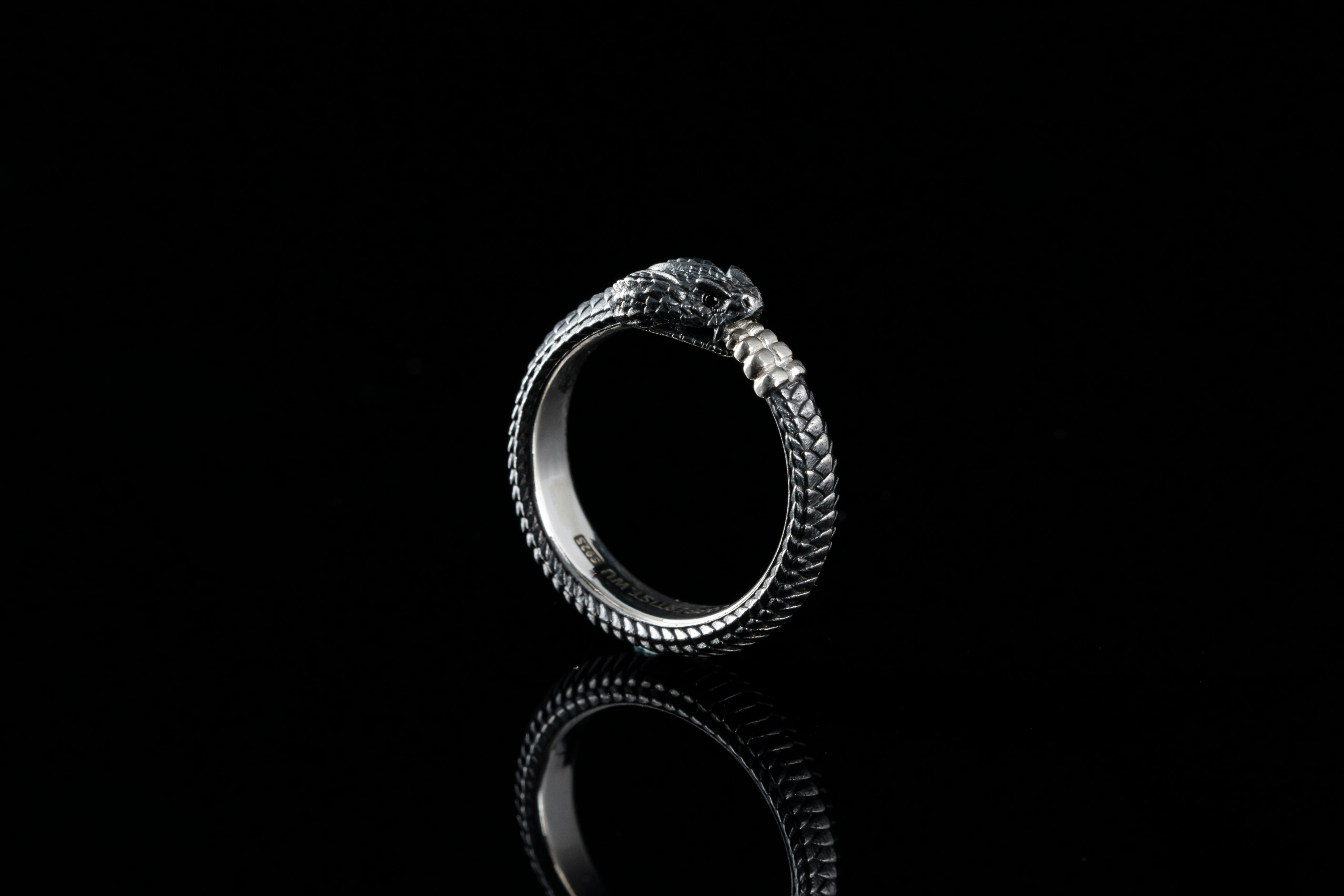 Handcrafted in oxidised silver
